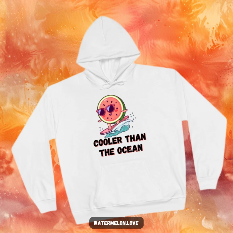 Funny kawaii watermelon slice with sunglasses surfing on a tiny wave, a cozy and humorous hoodie.