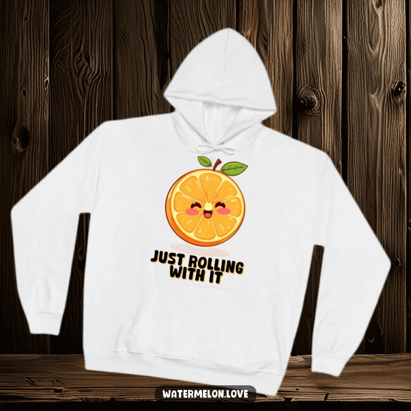 Funny hoodie showcasing a cheerful orange segment in a dynamic spinning pose, perfect for cozy, humorous wear.